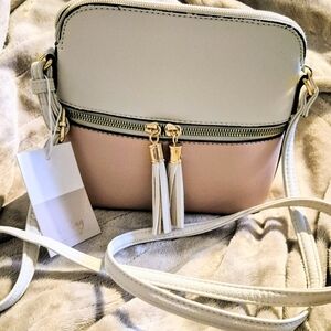 White and Blush Crossbody Bag with Tassel Accent